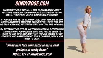 Sindy Rose take wine bottle in ass & anal prolapse at sandy dunes